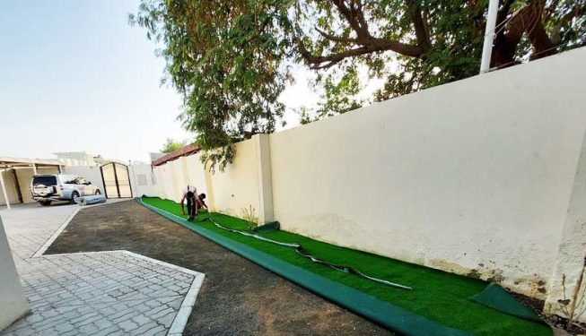 artificial grass installation in Al Ghubaiba